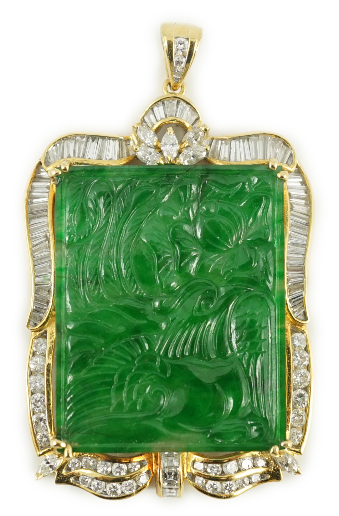 A late 20th century gold (tests as 18ct) mounted jade pendant, with round, marquise and trapeze cut diamond set border